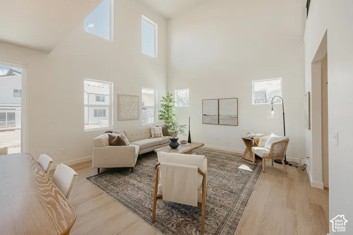 Soaring vaulted ceilings with transom windows