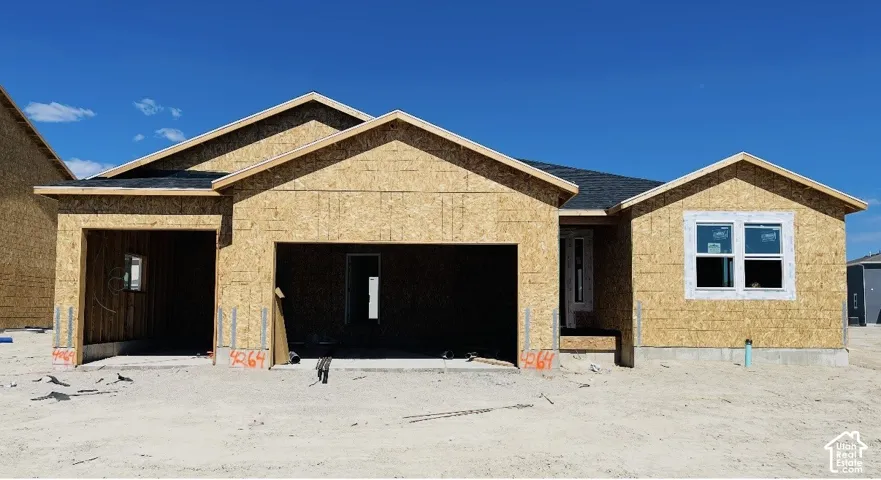 Alder Elevation C with 3 car garage and front yard landscaping to be installed.