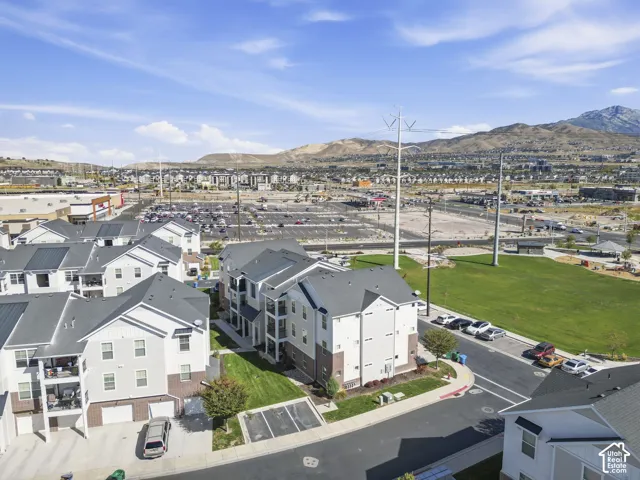 Multi-story residential buildings with attached garages and private balconies