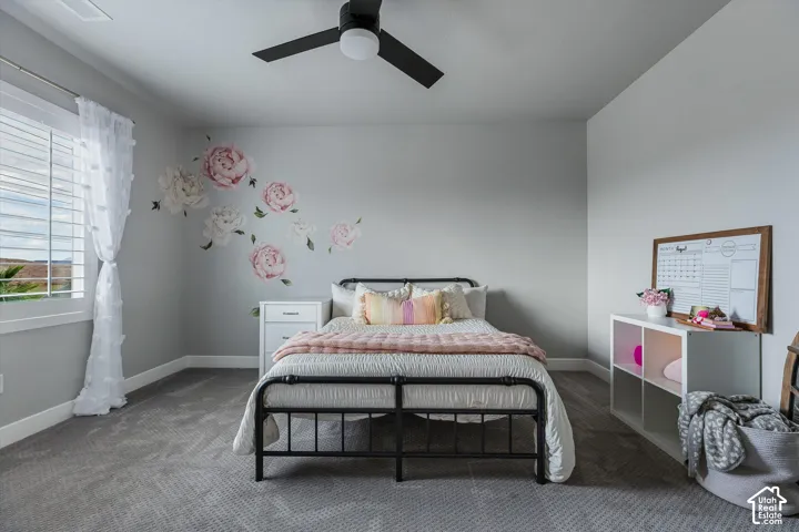 Recessed lighting, ceiling fan, carpeted flooring, wall-mounted shutters, and white trim