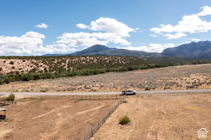 Expansive open land with a paved road