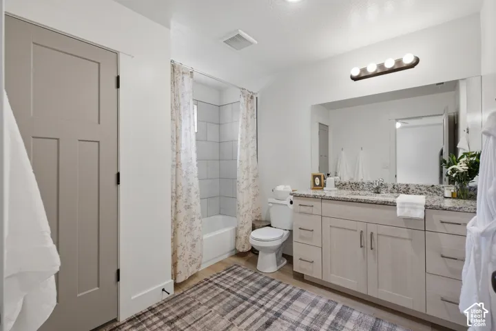 Master bath with large supply closet