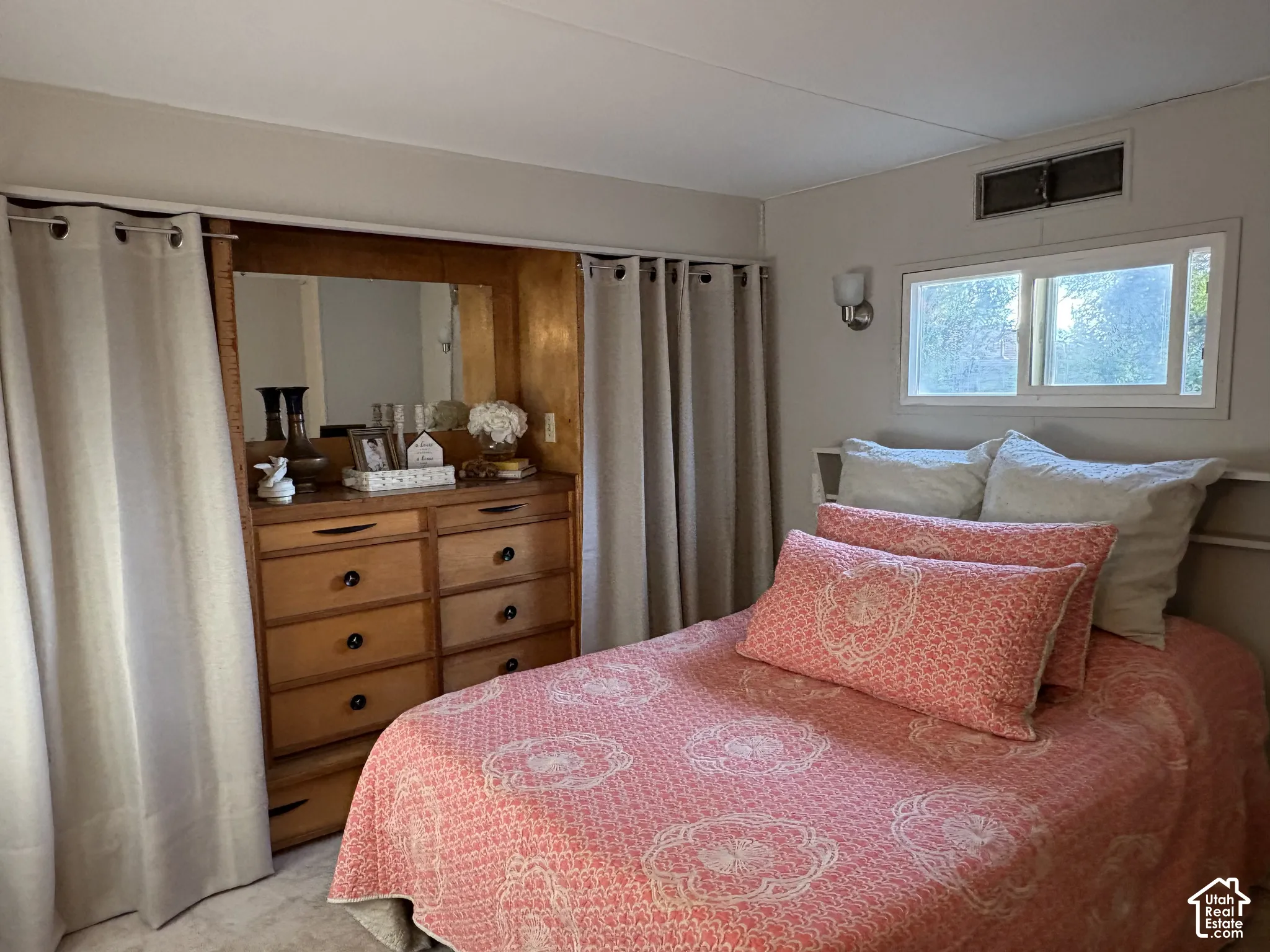 Built-in wood-finish dresser with integrated mirror
