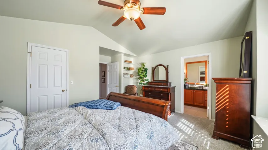 Vaulted ceiling with a ceiling fan