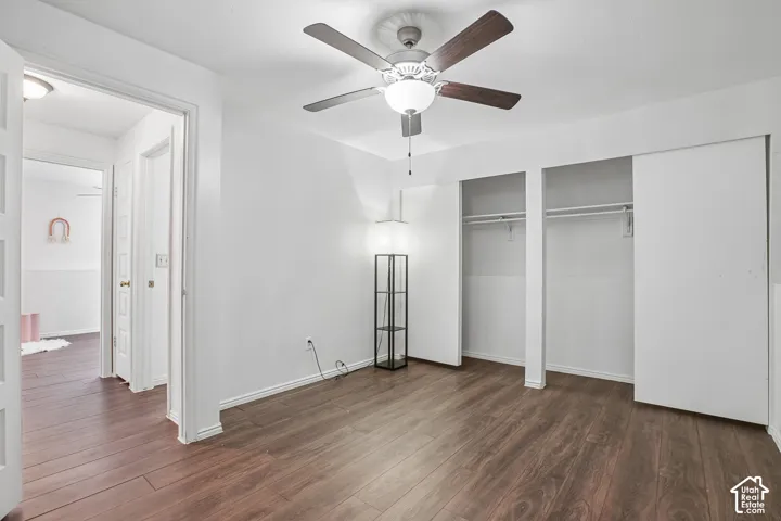 Wood-finish flooring, ceiling fan with integrated lighting, and integrated closet storage