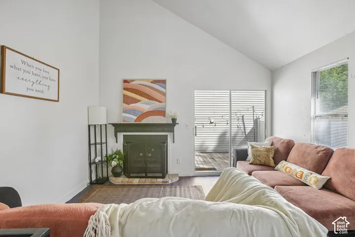 Vaulted ceiling with wood-finish flooring
