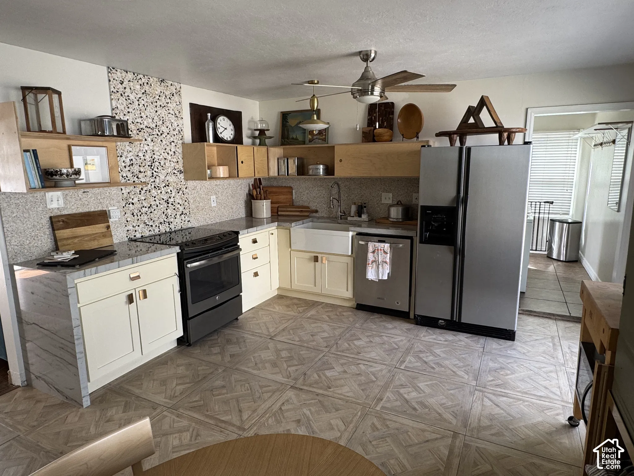 Midcentury modern custom birch cabinets with Terrazzo tile and granite countertops