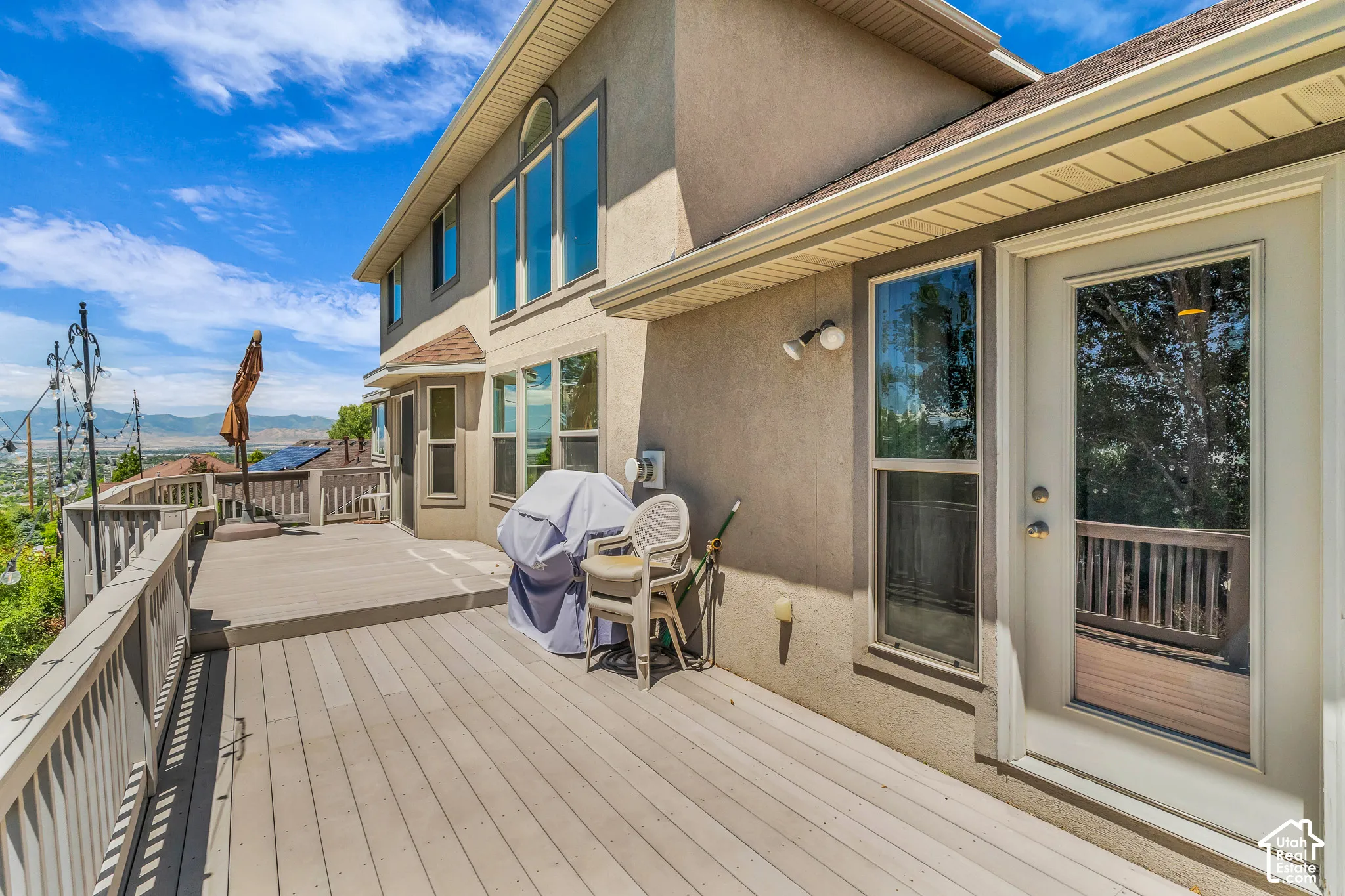 Multi-level deck with a wood-finish surface