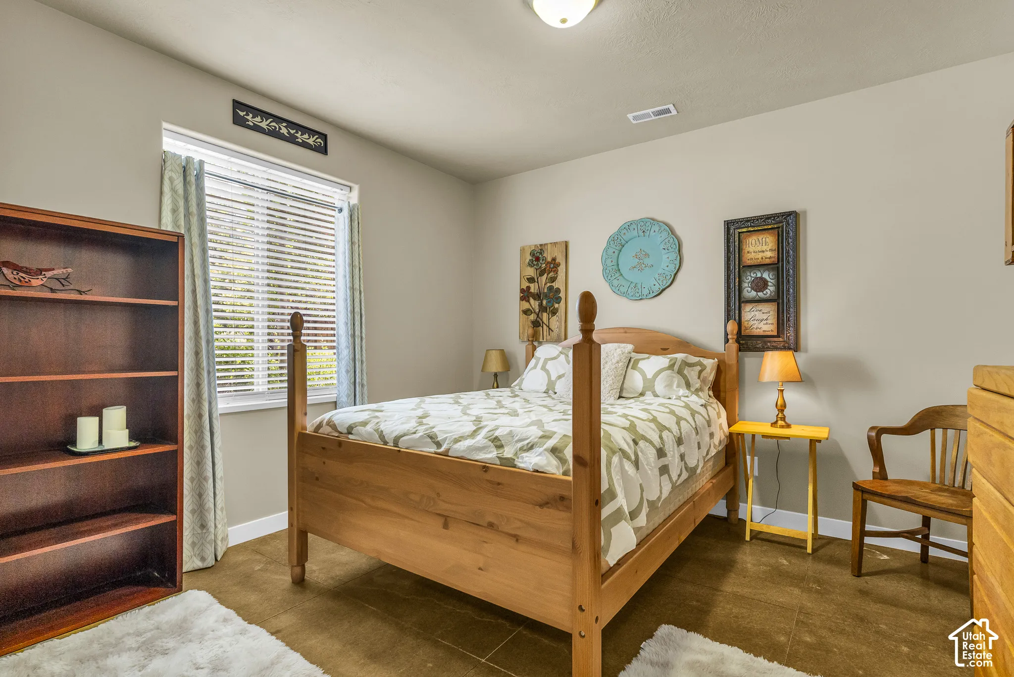 Recessed lighting, window with blinds, wood-finish flooring, built-in shelving, neutral wall color