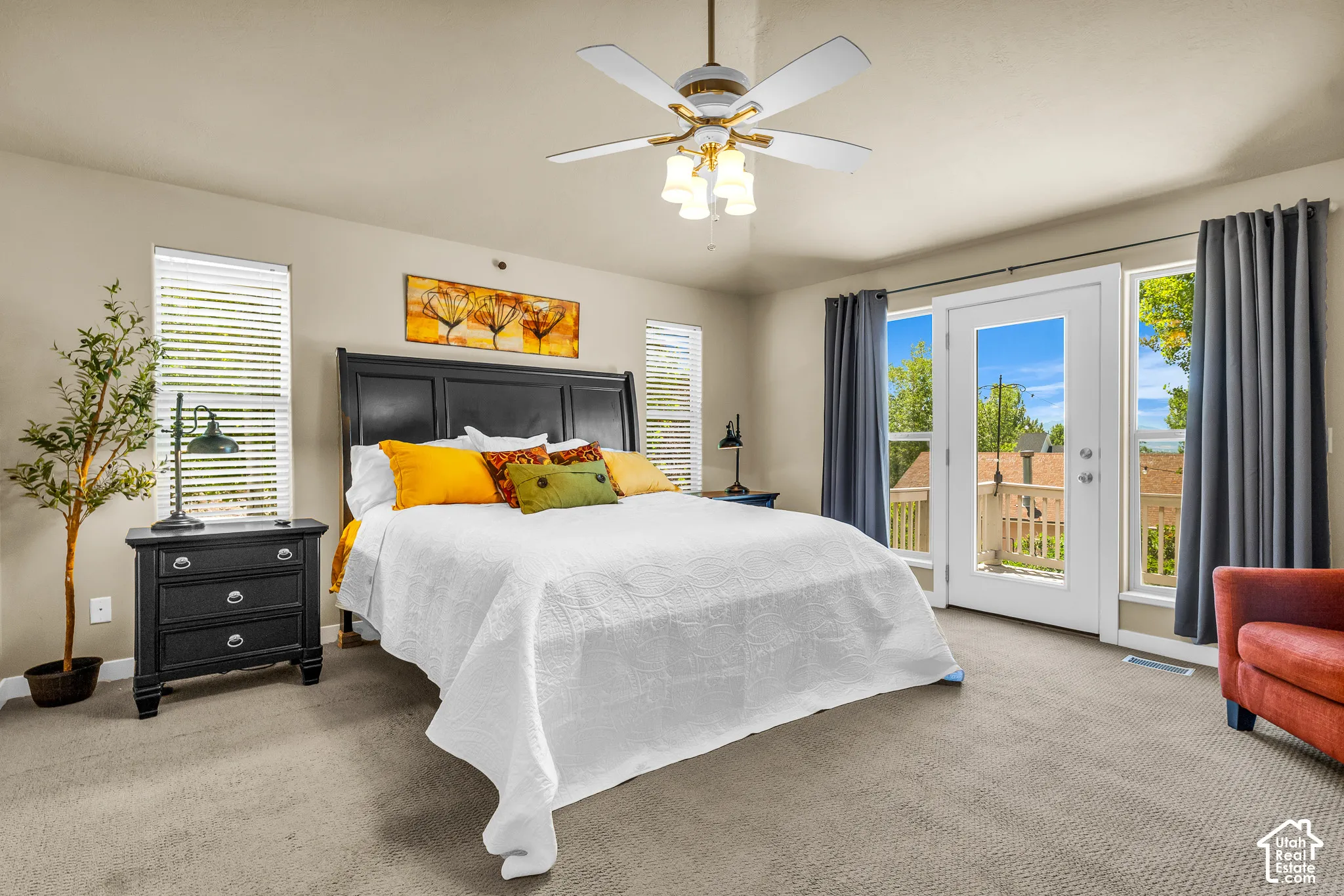 Neutral-toned walls complement the carpeted flooring