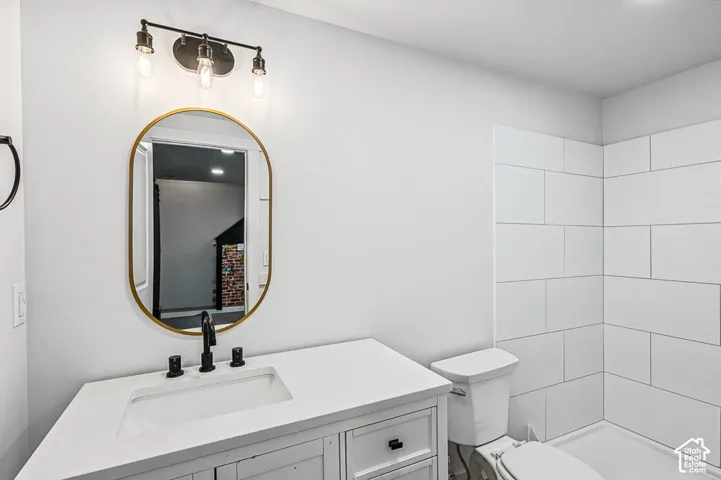 3/4 Bathroom with newer shower tile - Basement