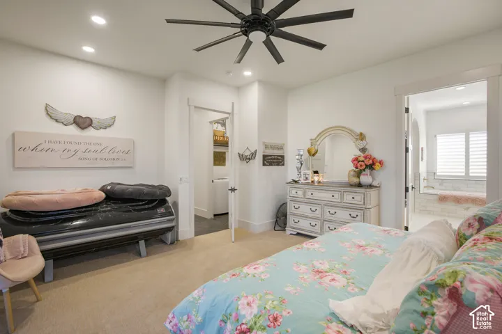 Recessed lighting, ceiling fan, and carpeted flooring