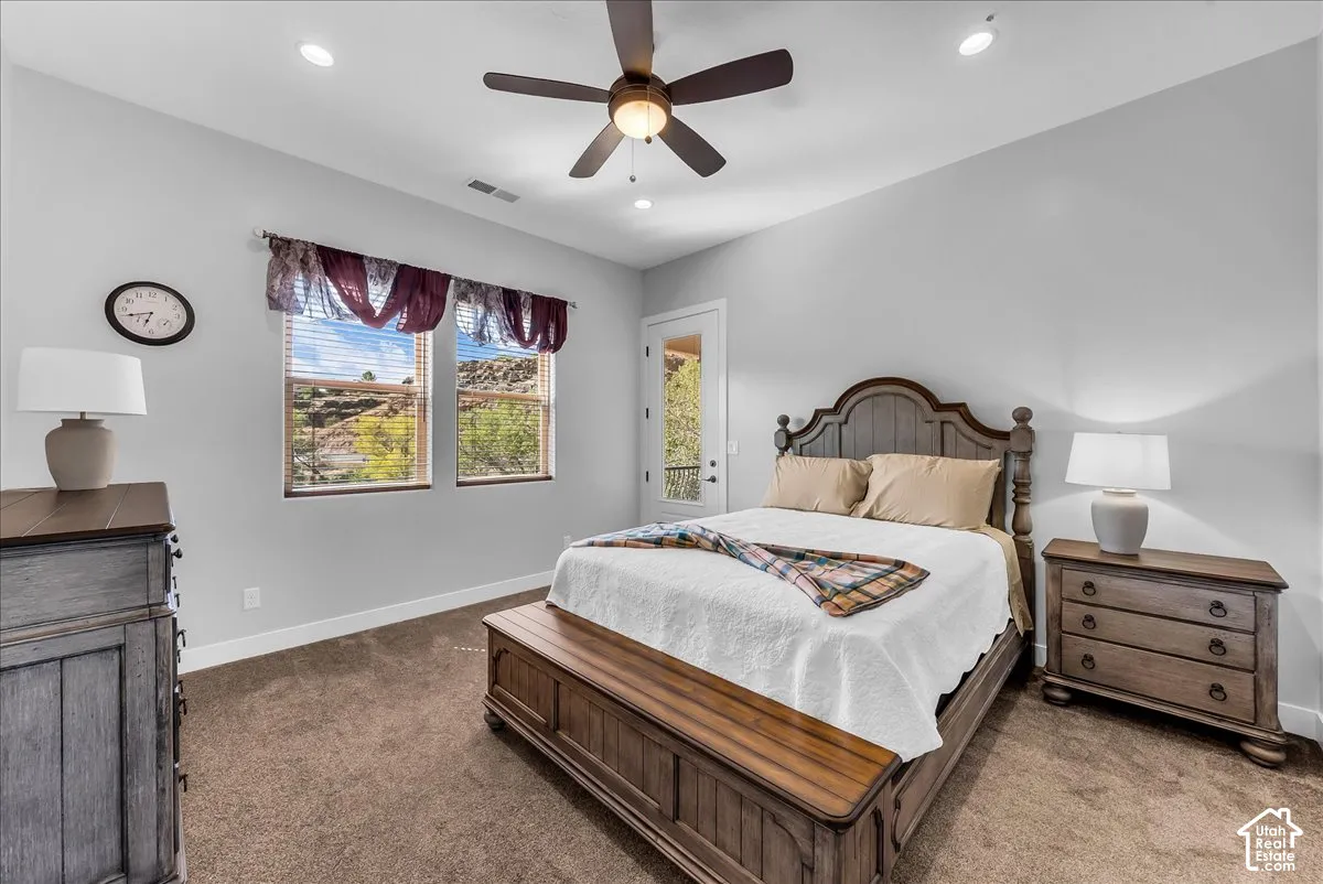 Recessed lighting, ceiling fan, and carpet flooring