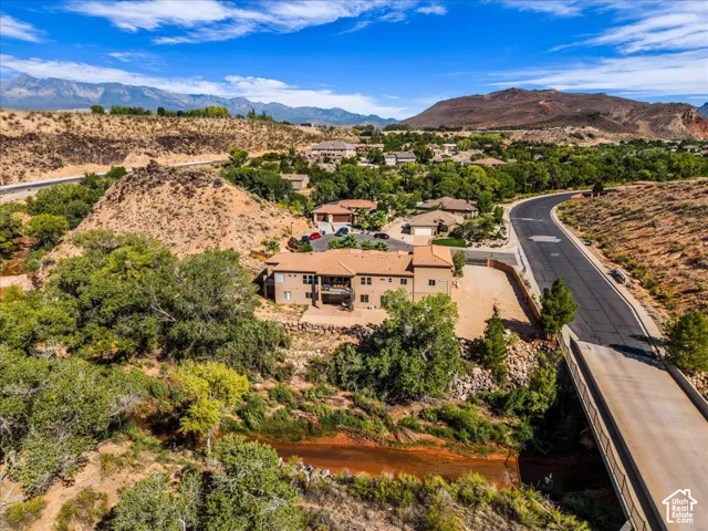 Terracotta tile roofing atop a multi-level structure with a patio