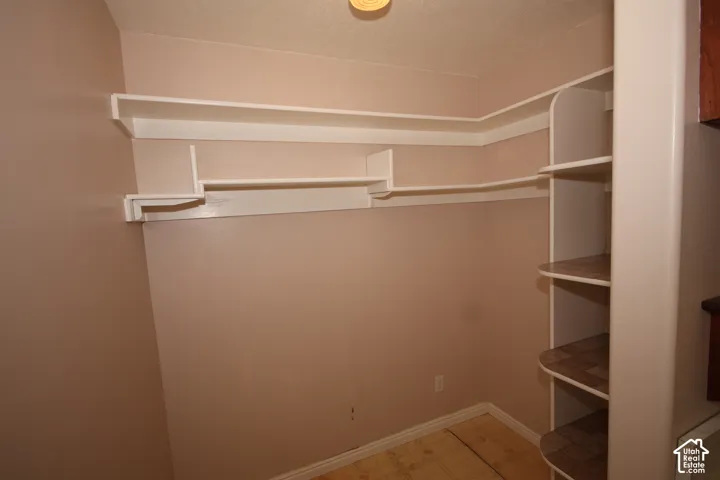 located next to laundry room and kitchen