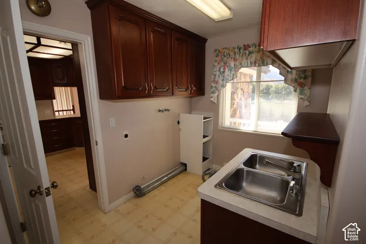 Double basin stainless steel sink with a chrome faucet