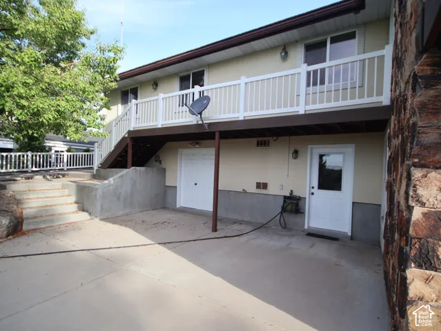 Walkout basement, double doors are storage or work room, single door is to utility room