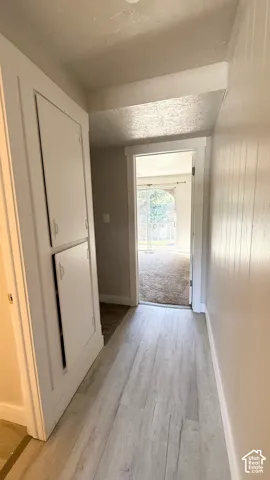 Wood-finish flooring with built-in cabinetry