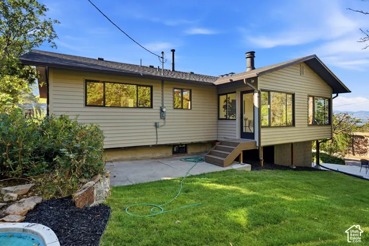 Hardie Plank siding exterior, multi-pane windows, and a multi-level roofline