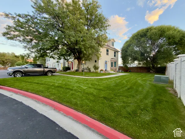 Grassy area next to the townhouse
