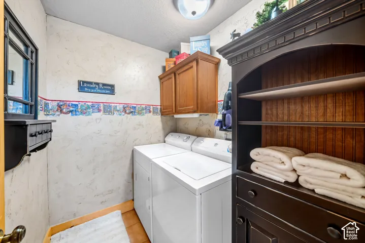 Built-in dark wood cabinetry with open shelving and lower storage