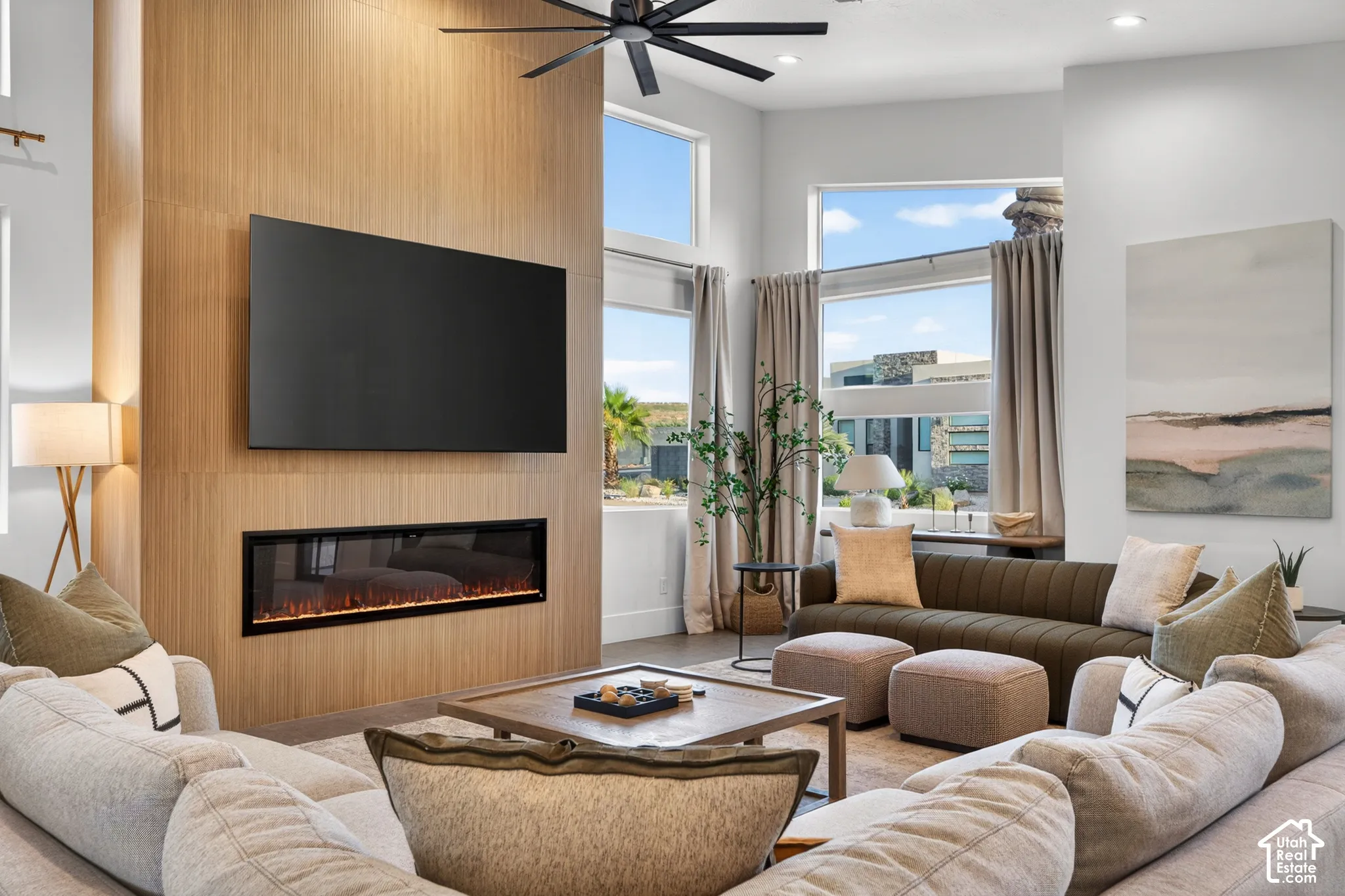 Wood-paneled accent wall with integrated linear fireplace