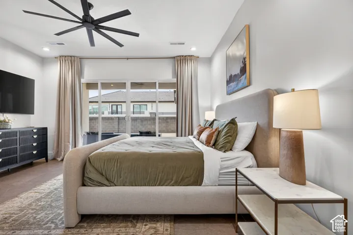 Wood-finish flooring, recessed lighting, and a modern ceiling fan
