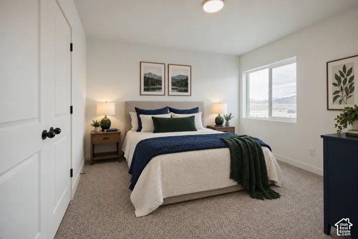 Soft-toned walls complement a large window, providing natural light