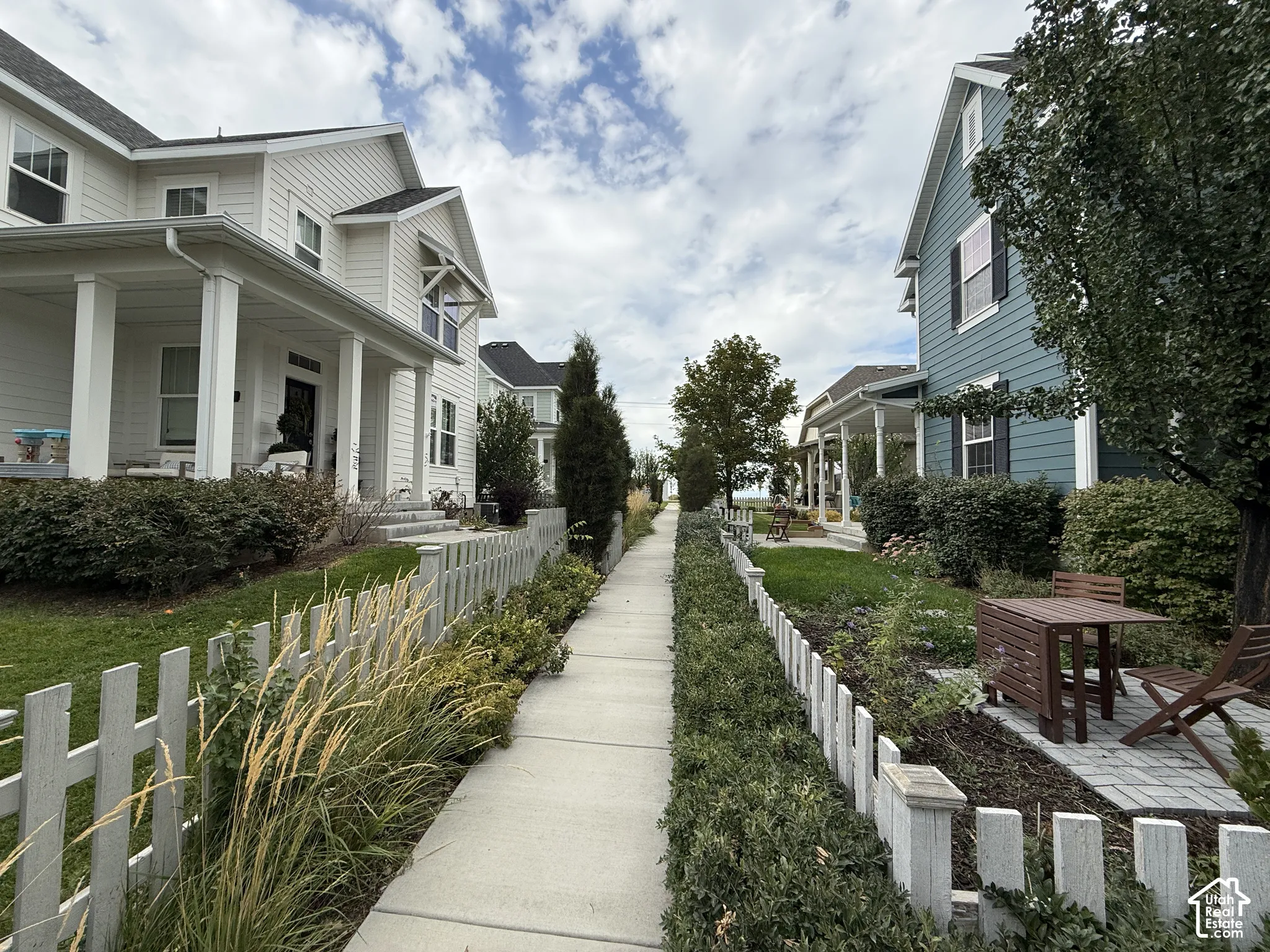 Concrete walkway leading to house