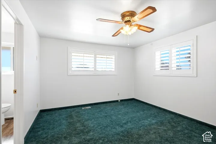 Bedroom #2 Fresh Paint, ceiling fan, plantation shutters