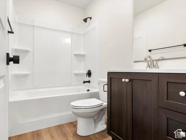White shower-tub combination with matte black fixtures