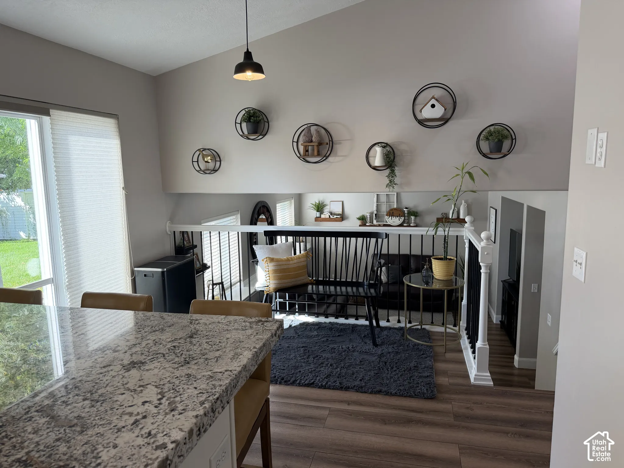 Vaulted ceiling with an attached pendant light