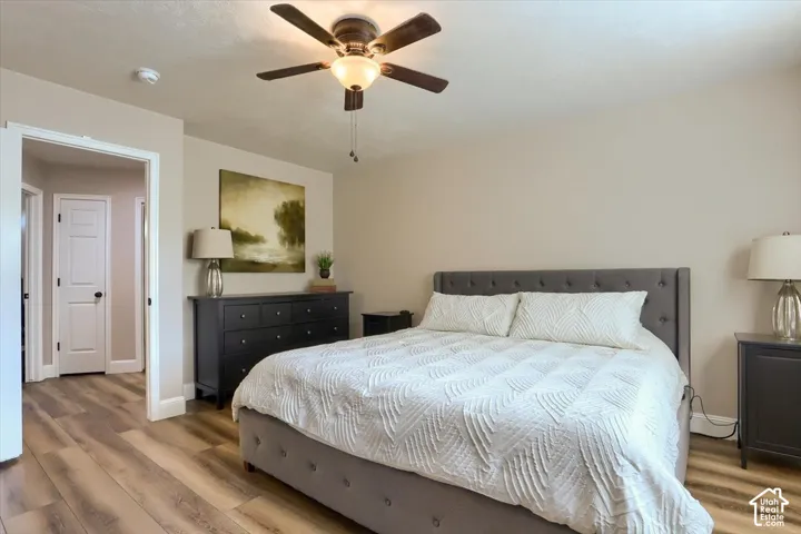 Wood-finish flooring throughout, complemented by light-toned wall paint