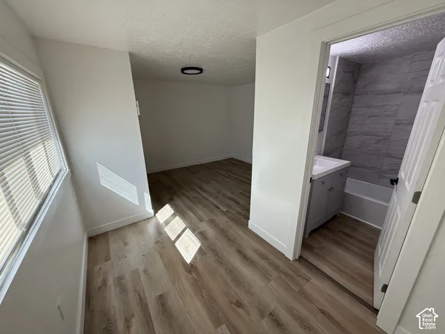 Wood-finish flooring throughout
