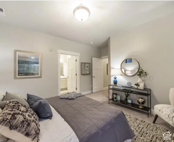 Recessed ceiling lighting, paneled interior door, light-toned wall paint, carpeted flooring, and a semi-flush mount ceiling fixture