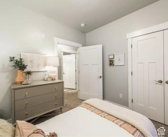 Neutral-toned walls, white trim, and doors with a three-panel design