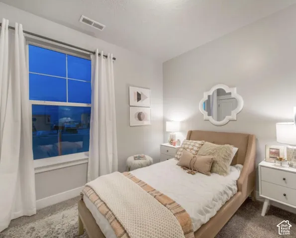 Window with white trim and white curtains
