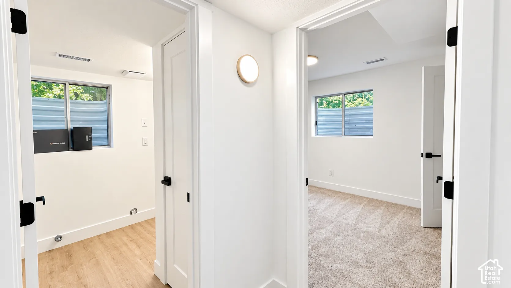 Two white doors with matte black hardware