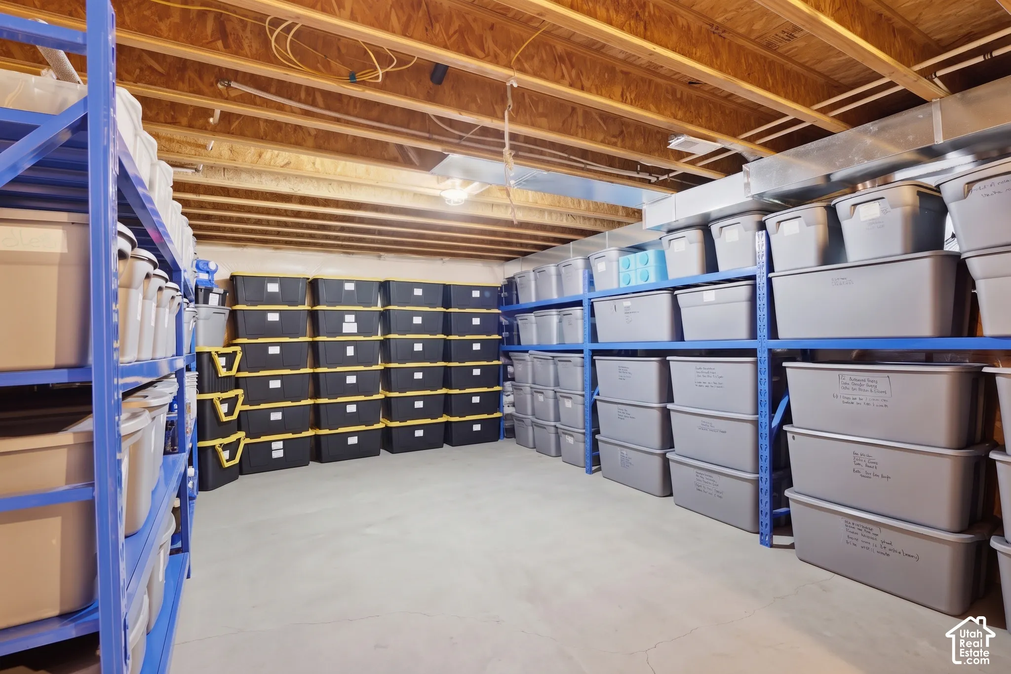Finished concrete flooring with exposed wood ceiling joists