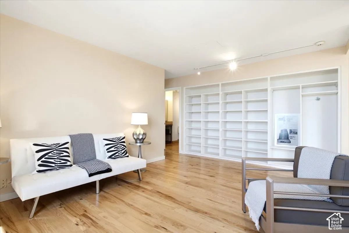 This area was the second bedroom and was opened up as a library/music room/office. Wall can easily be installed for 2nd bedroom again. Nice built-in shelvi