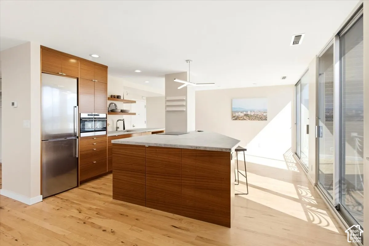 Custom lacquered cabinets and beautiful hardwood flooring