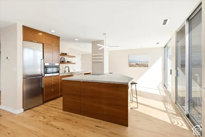 Custom lacquered cabinets and beautiful hardwood flooring