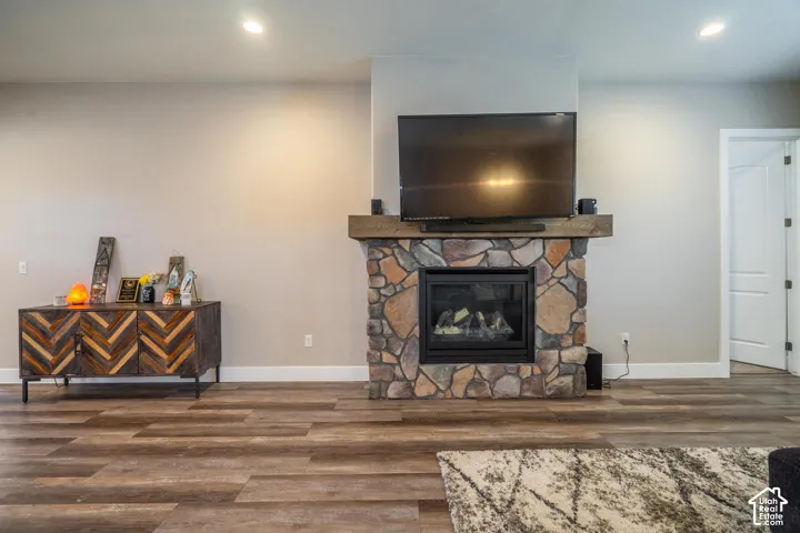 Stone-surround fireplace with a wood mantle