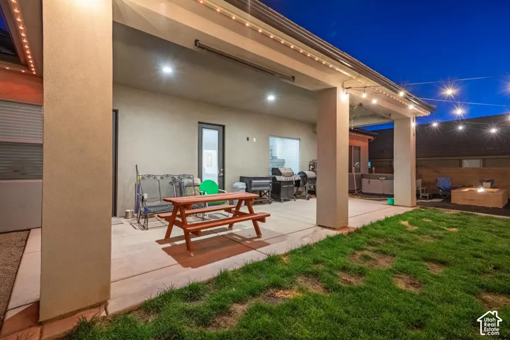 Covered patio with recessed lighting, concrete flooring, and string lights