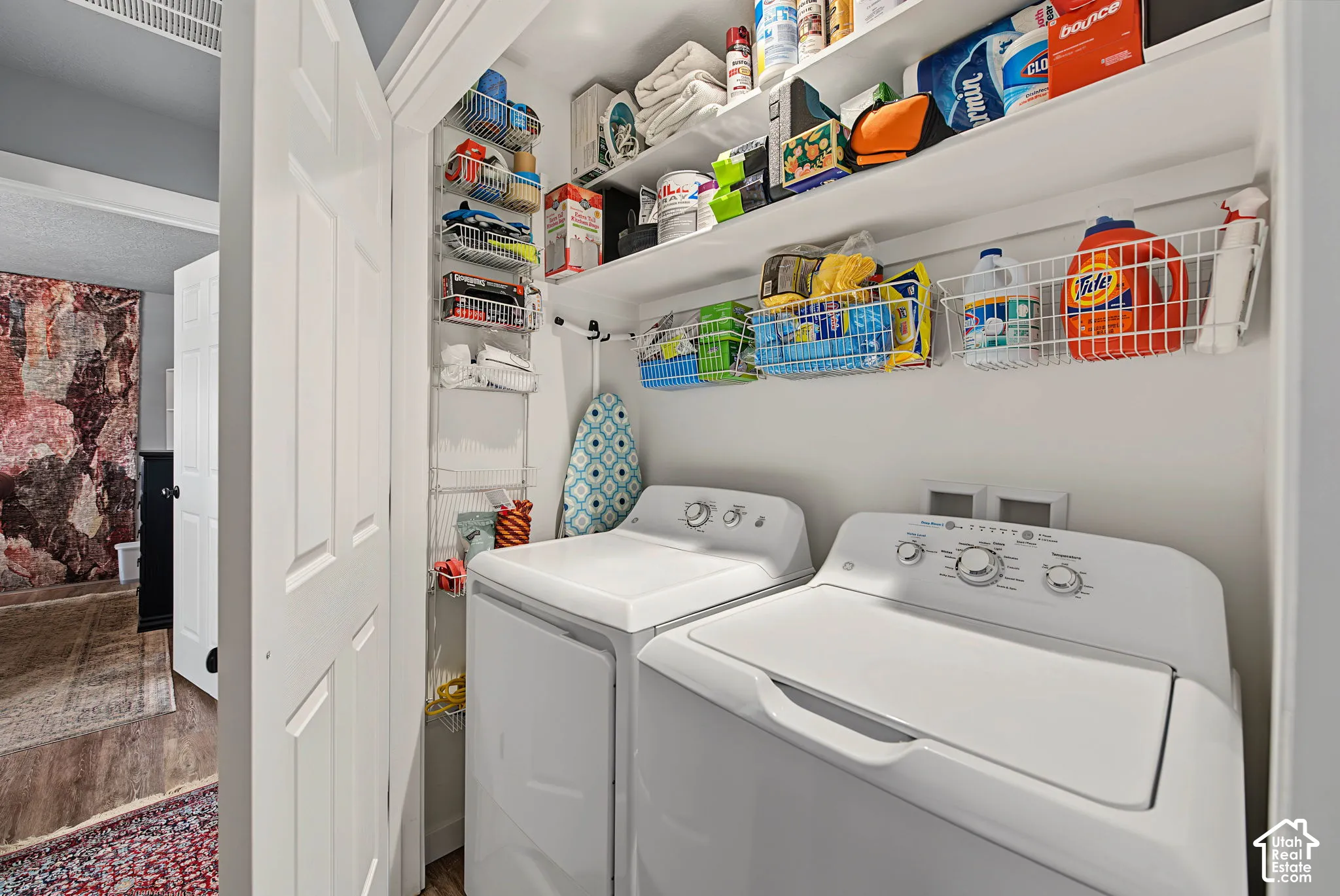 Built-in shelving and wire baskets provide organized storage