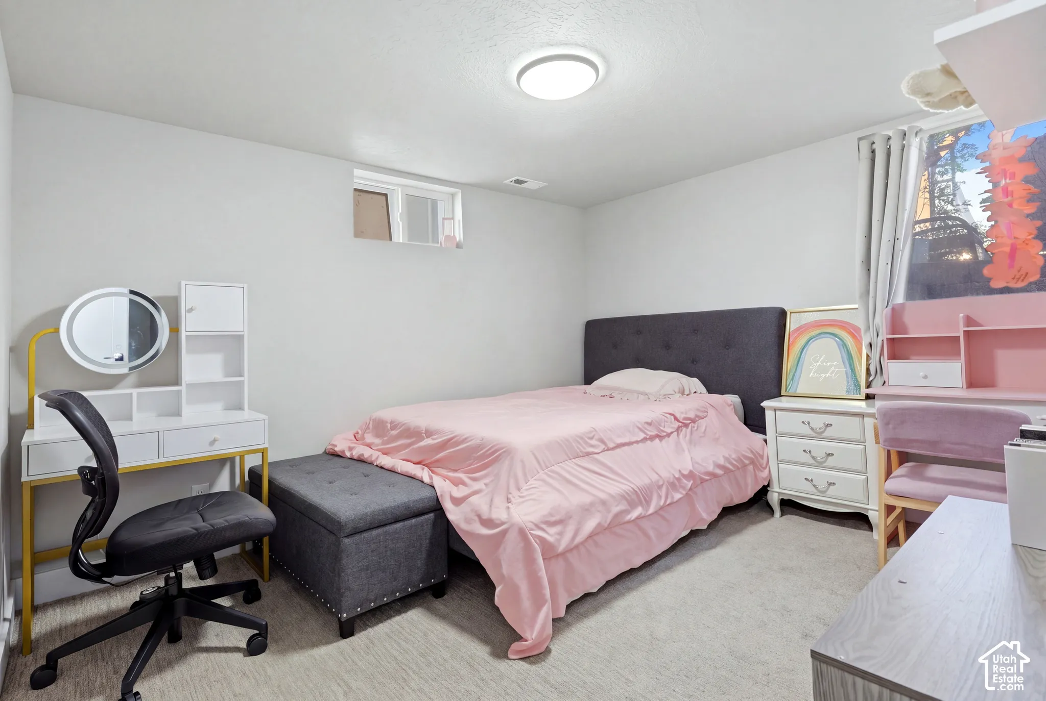 Carpeted flooring, recessed window, and flush-mount ceiling light