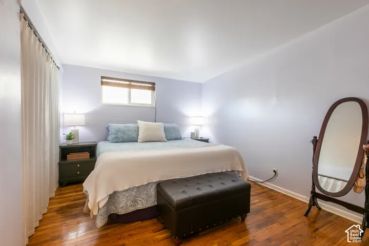 Wood-finish flooring with light purple walls