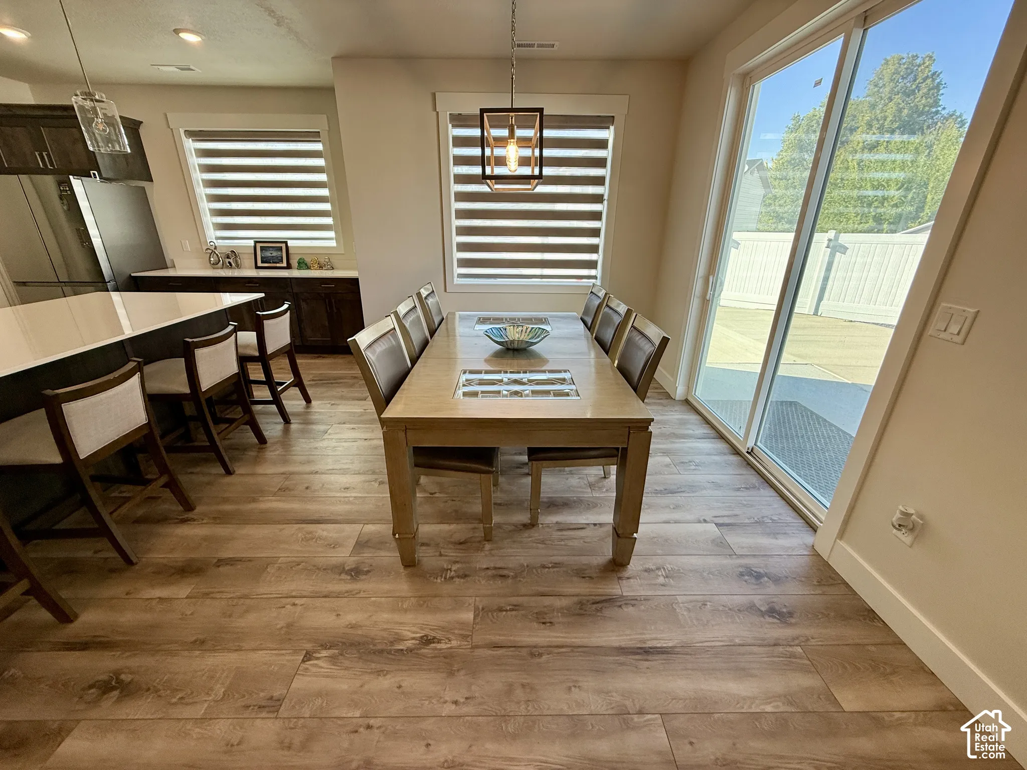 Wood-finish plank flooring throughout