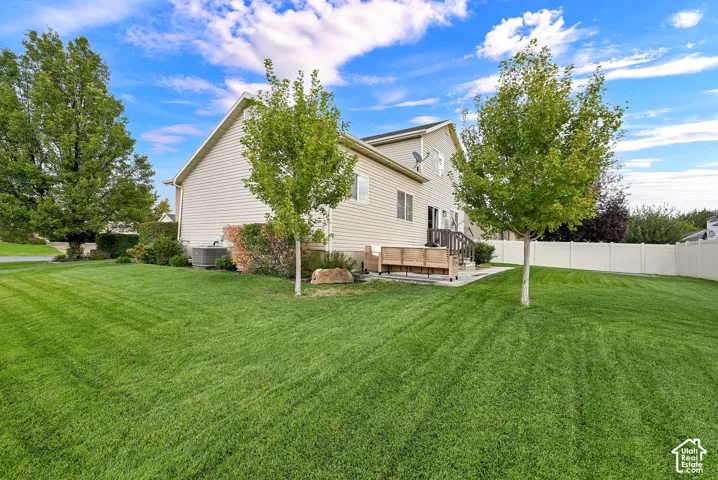 Expansive lawn area with mature trees