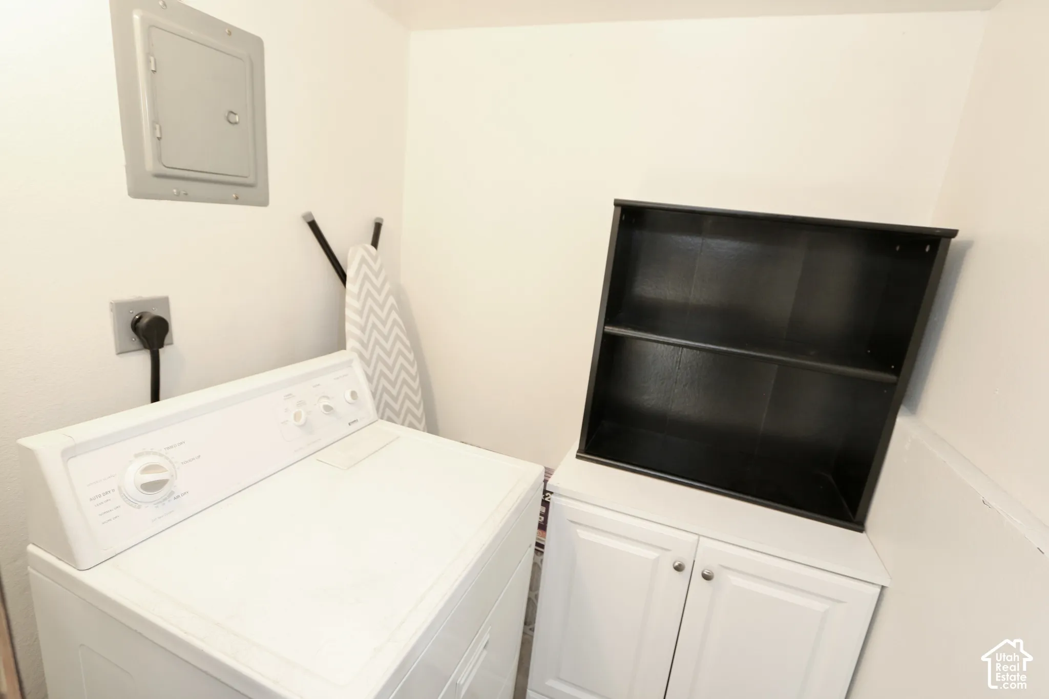 Additional laundry area with dryer